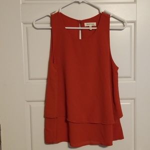 Sleeveless dark orange top